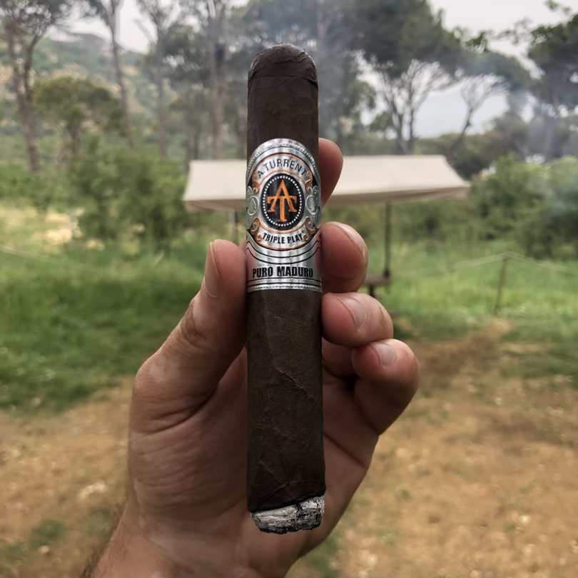 Smoking a cigar at Swings.