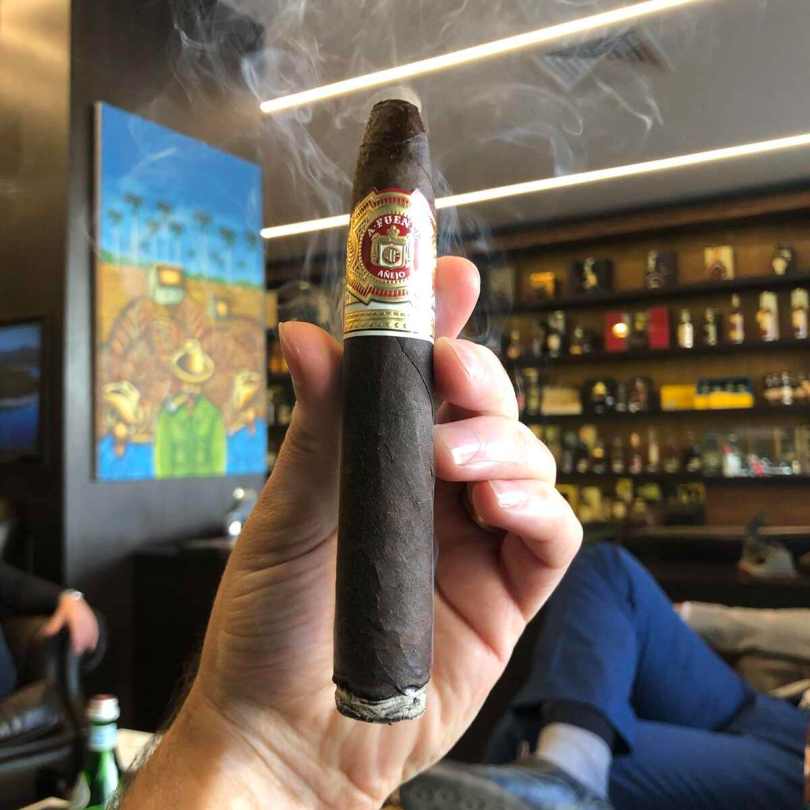 Smoking an Arturo Fuente Anejo 55 at Mareva Lebanon.