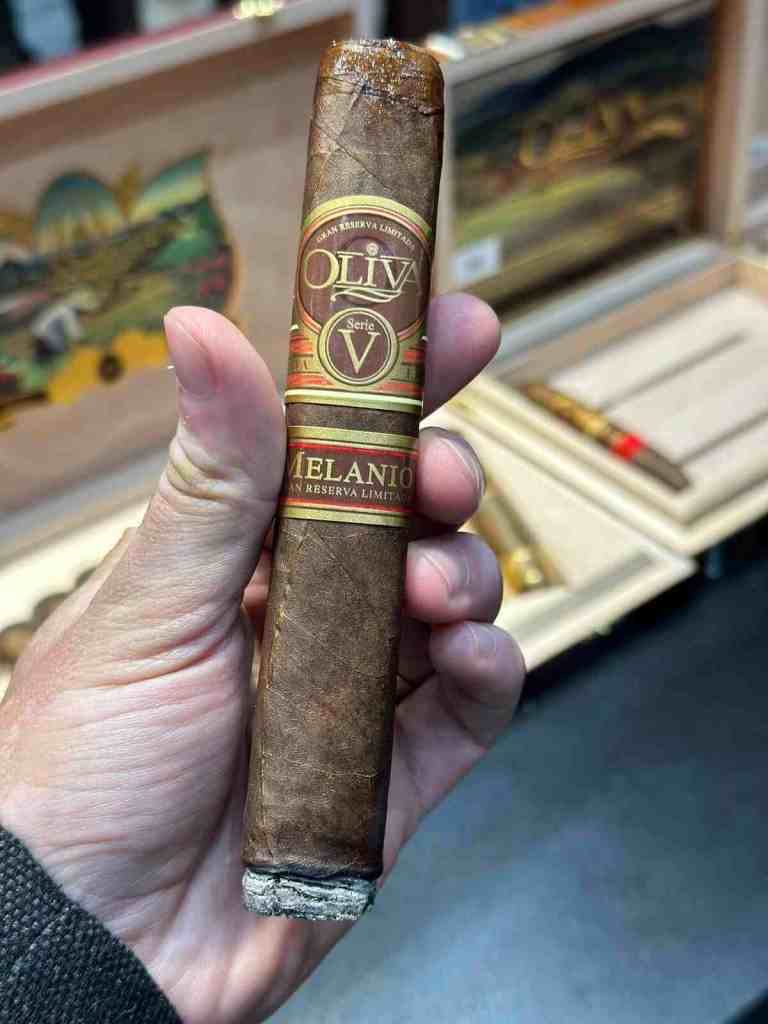 Smoking an Oliva Serie V Melanio Double Toro cigar at Whisky Live Beirut.